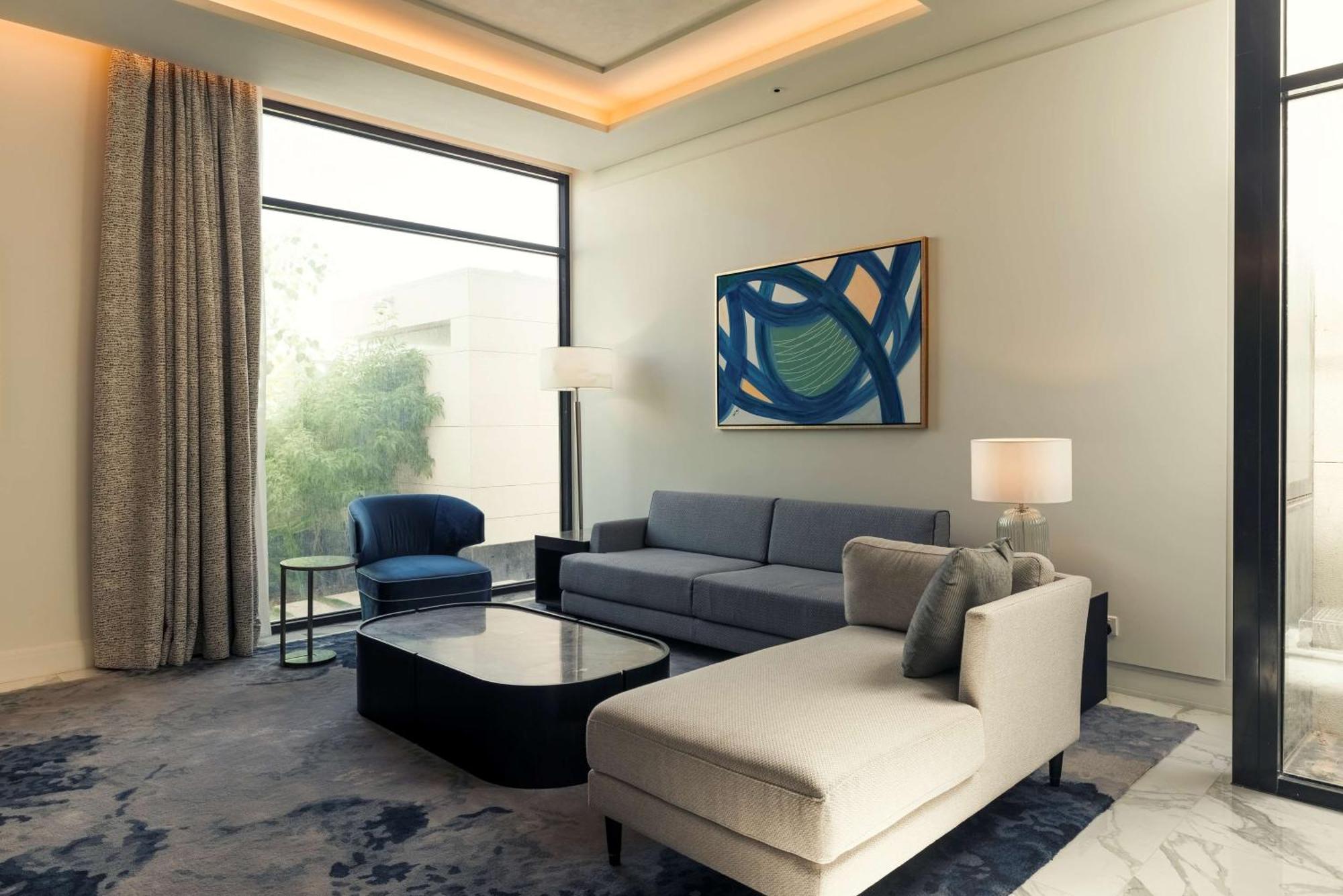 Mansard Riyadh, A Radisson Collection Hotel Exteriér fotografie A living room at the hotel